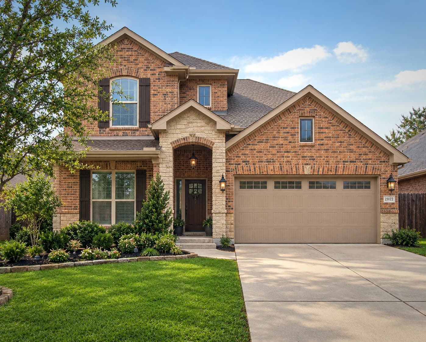 Bear Builders traditional brick custom home, daytime exterior