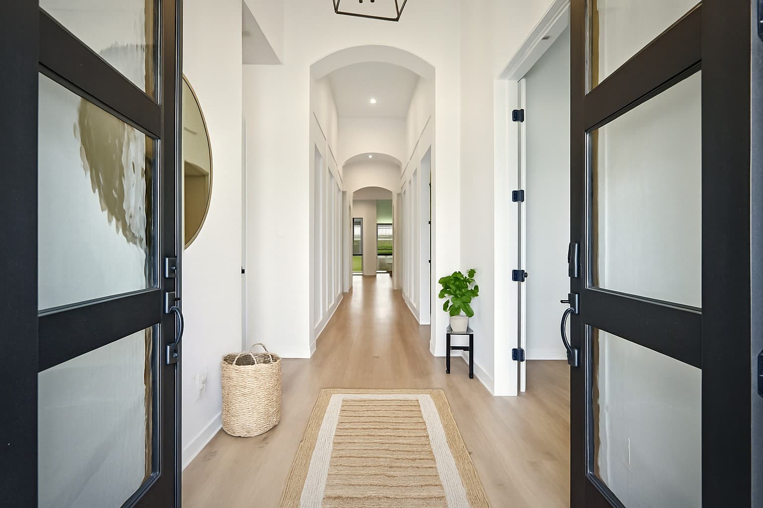 Bear Builders entry hallway with dark double doors