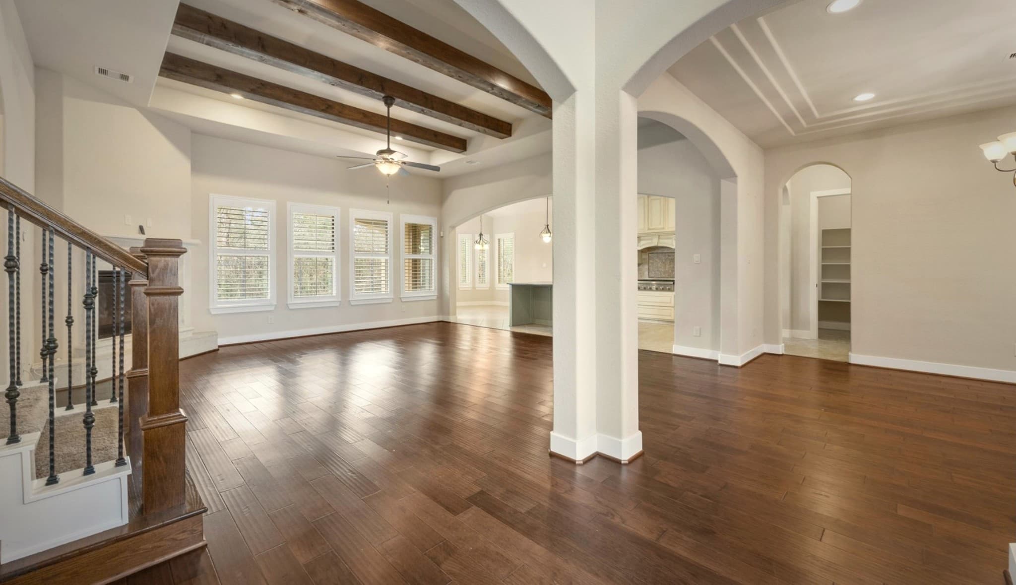Bear Builders great room with vaulted beamed ceiling