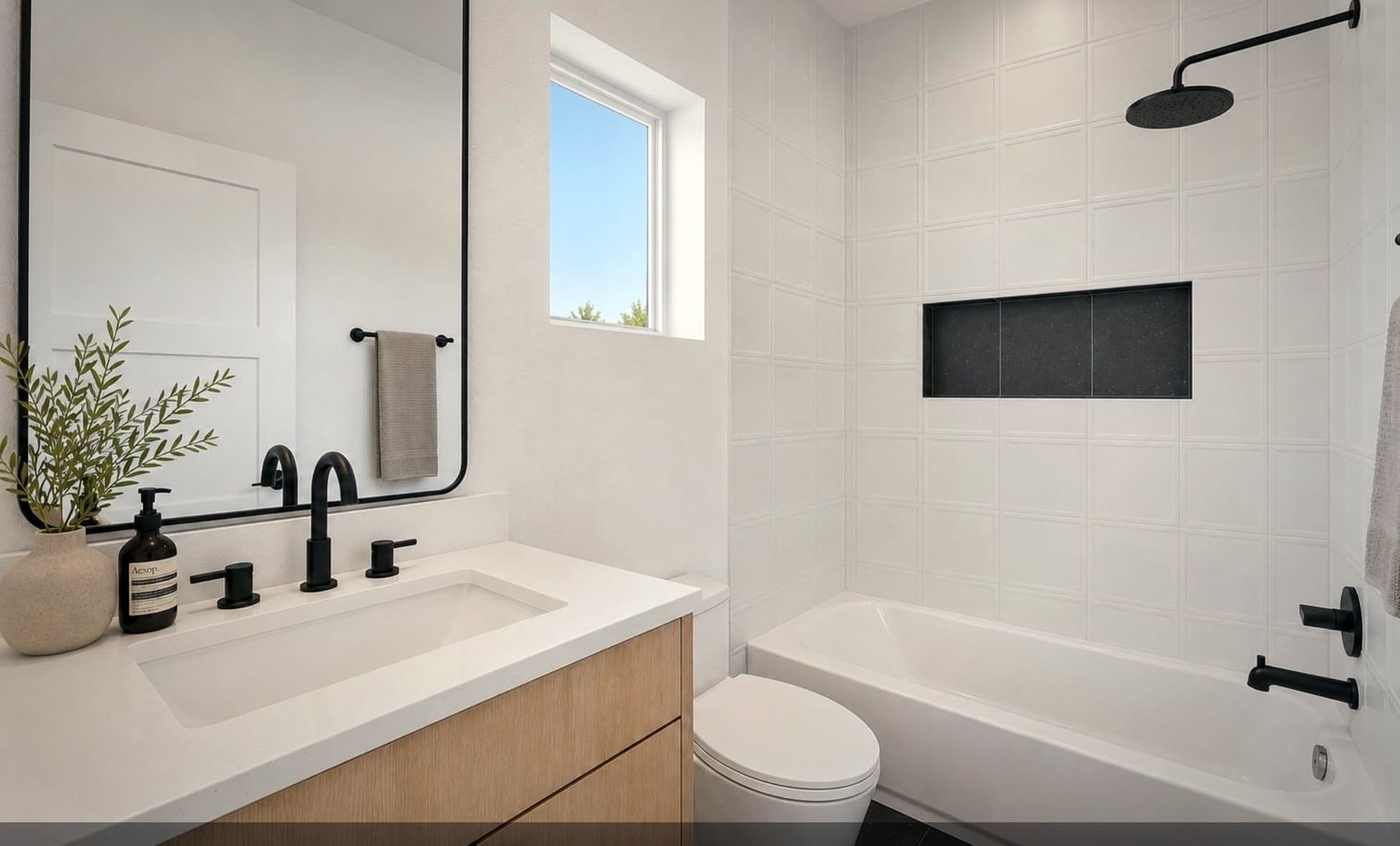 Bear Builders primary bathroom with freestanding tub and glass shower